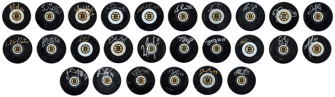 Collection of (26) Single Signed Boston Bruins Hockey Pucks (PSA/DNA PreCert)